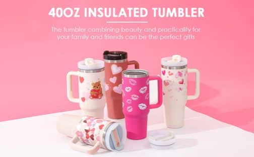 Decorative insulated tumblers on pink background.