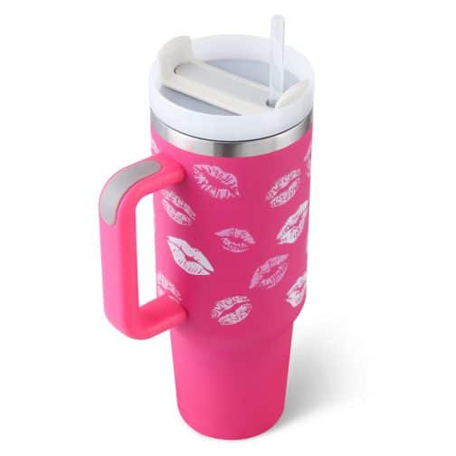 Pink insulated tumbler with lip prints design.