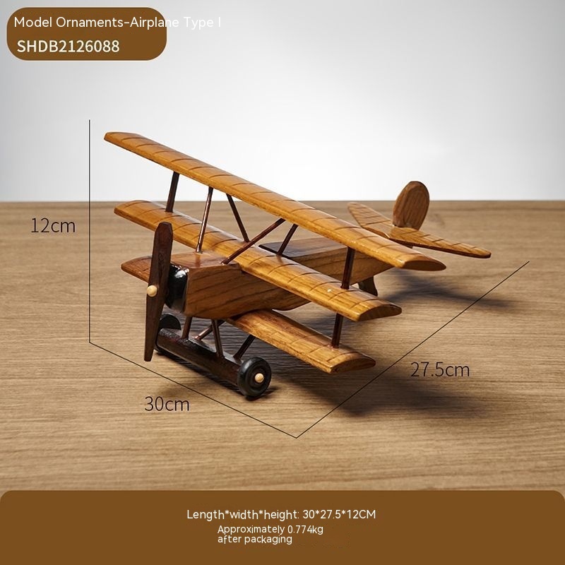 Wooden model airplane with dimensions shown.