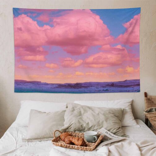 Cozy bedroom with colorful cloud tapestry on wall.