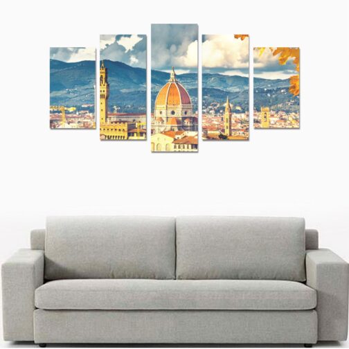 Multicanvas artwork of cityscape over gray couch