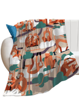 Couch with colorful monkey print blanket