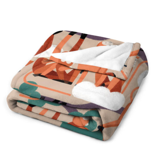 Colorful abstract-patterned blanket folded neatly.