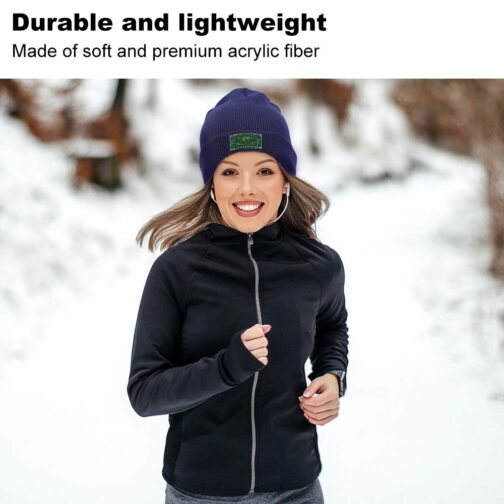Woman jogging in snow wearing beanie and jacket