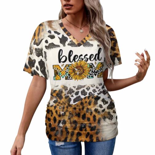 Woman in 'blessed mom' leopard print shirt.